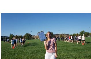 Morgan at an outdoor Greek Week event
